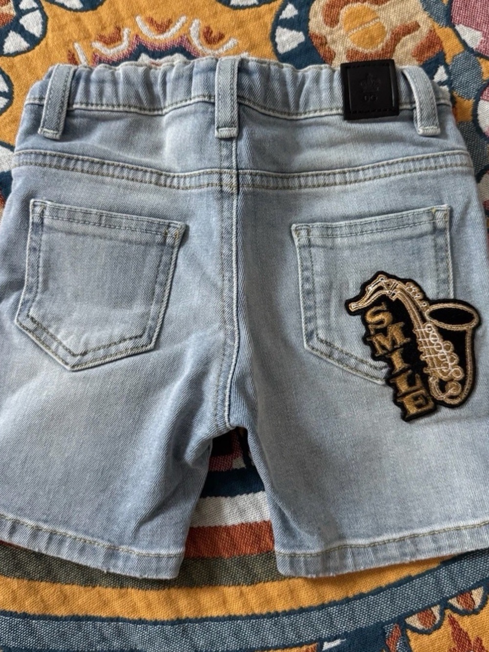 Dolce & Gabbana Light Blue Denim Shorts with Saxophone Patch